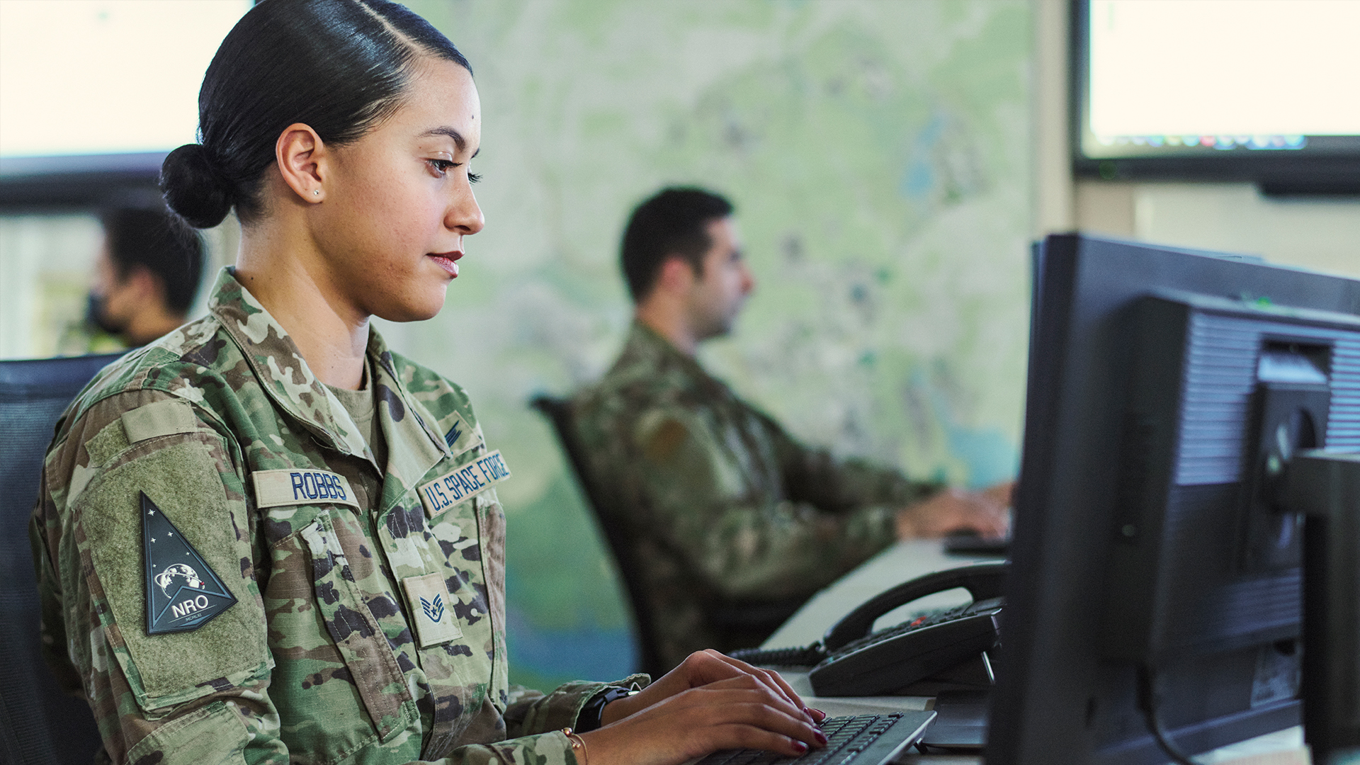 Chanel Robbs at her computer working