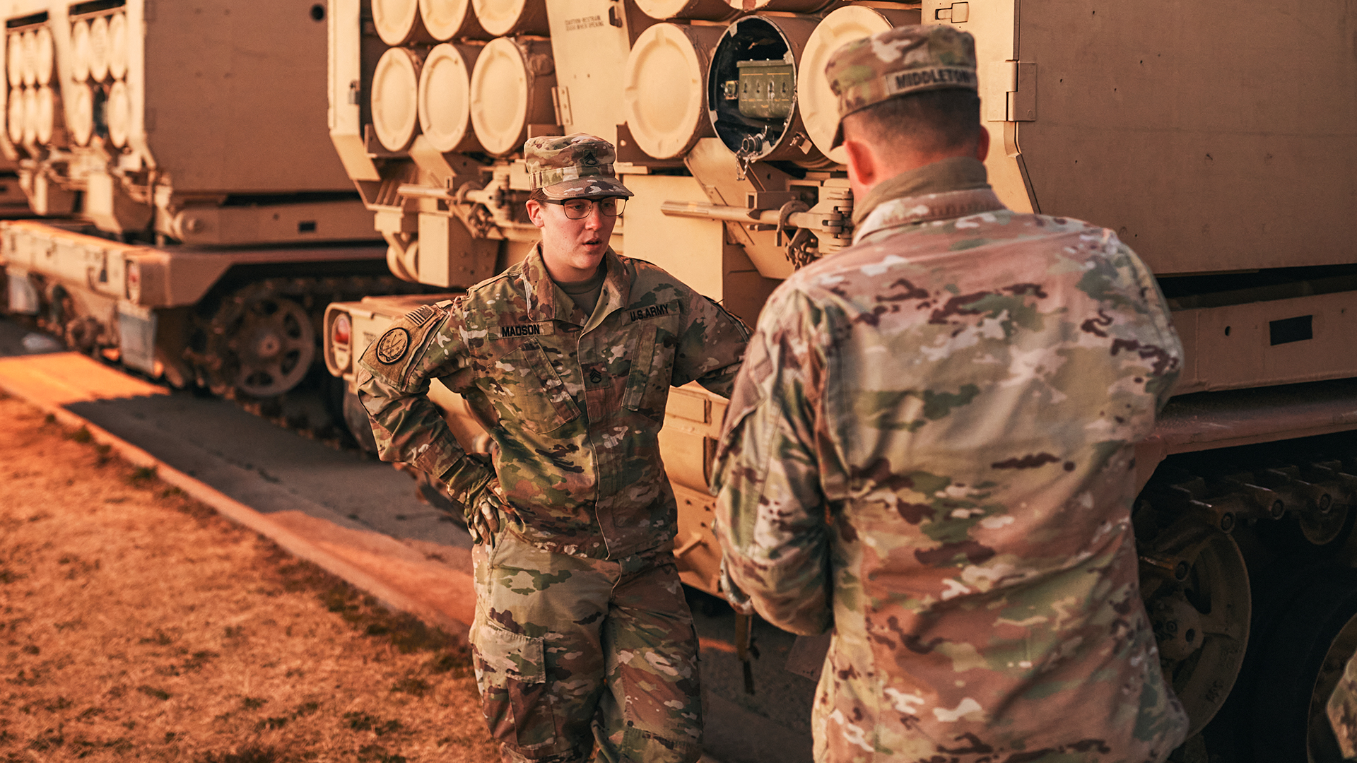 Jada Madson speaking with a coworker