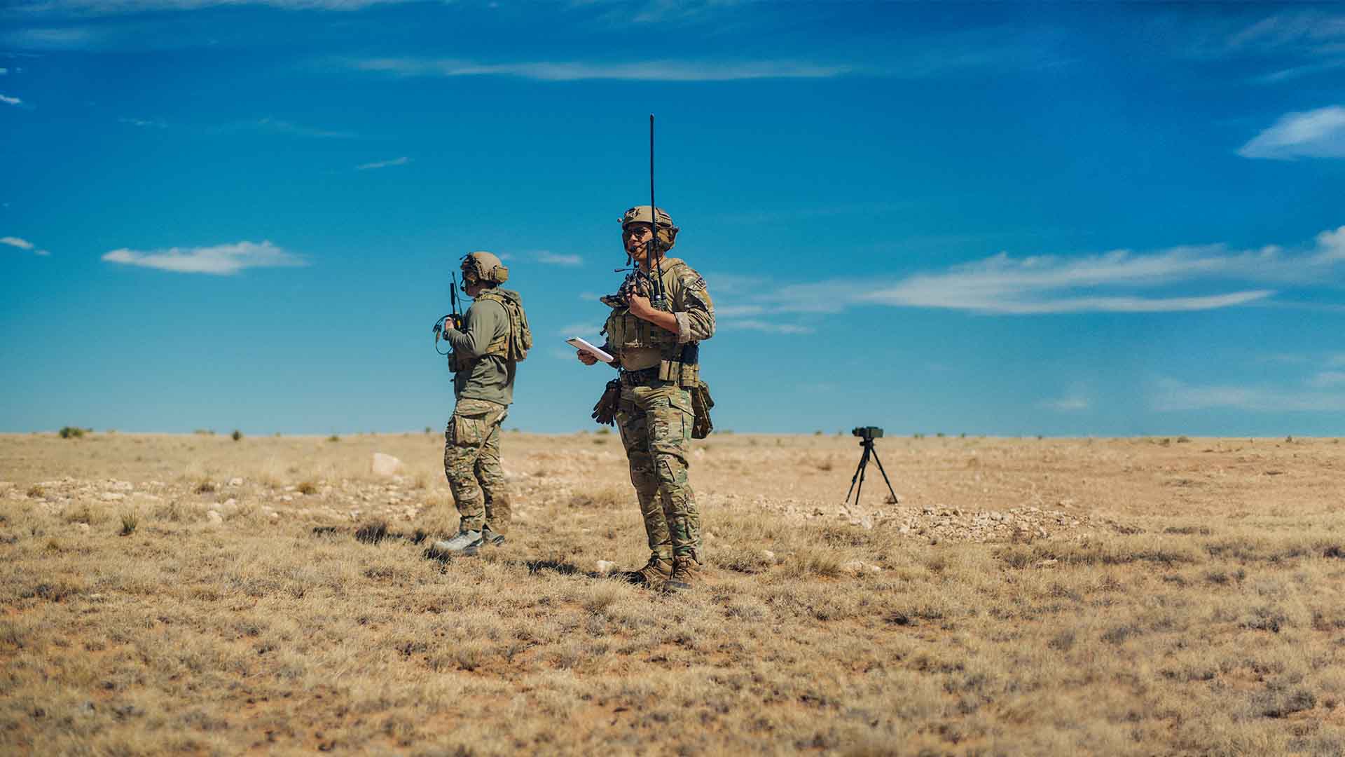 Ryan Bodden with another service member in the field.