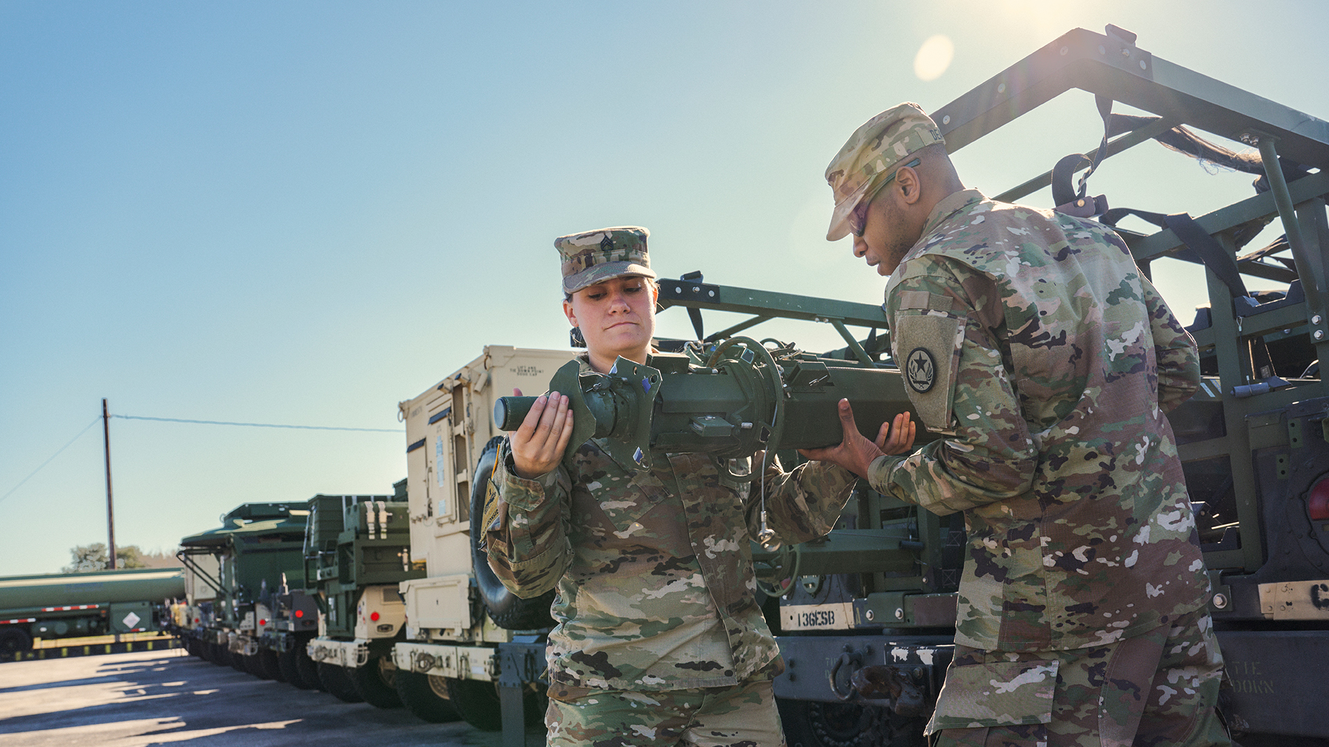 Miranda Delamorena loading a truck with a coworker