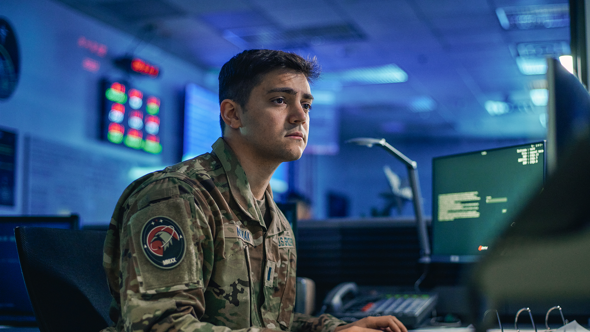 Jon Novak working at a desk