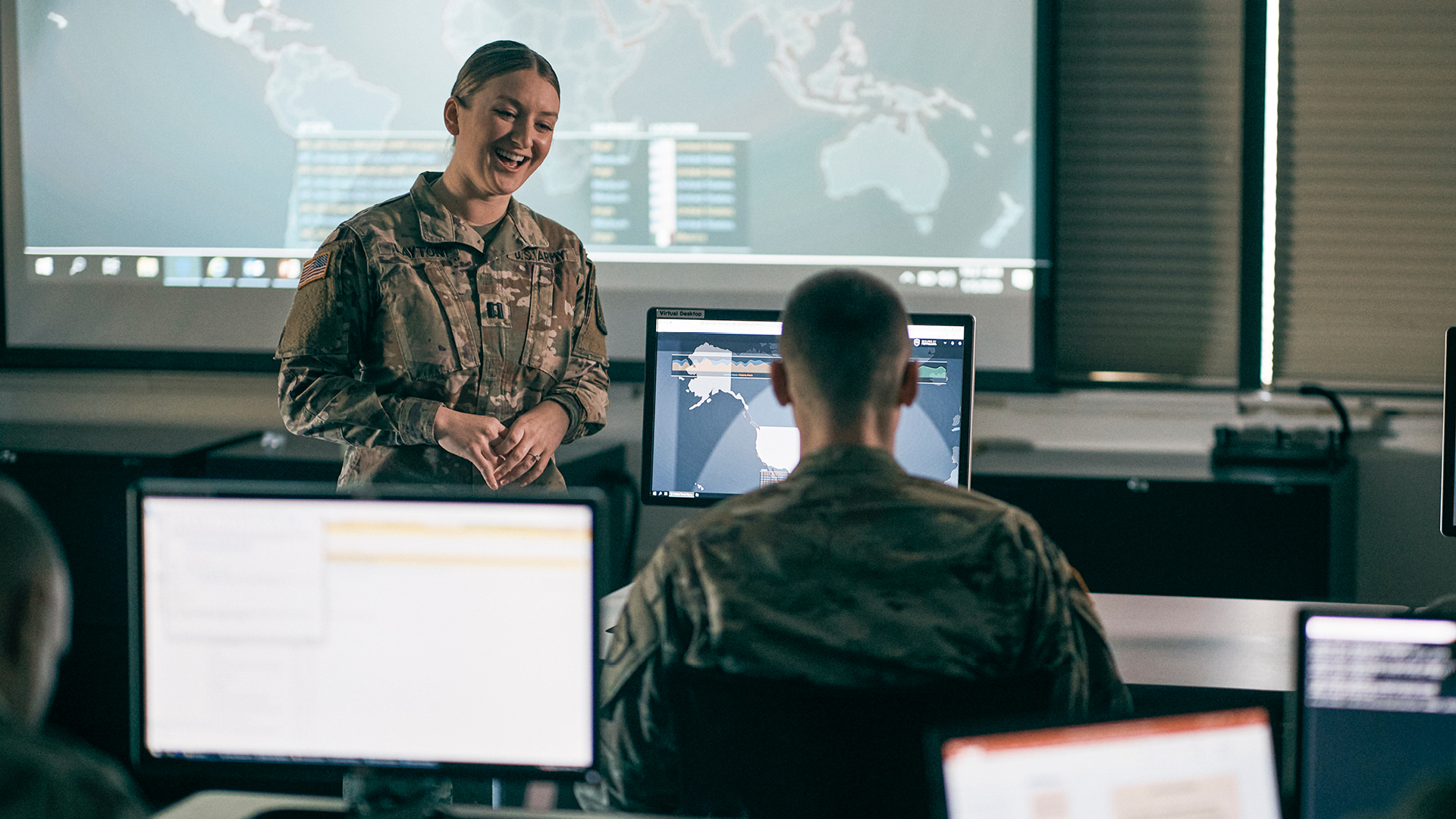 Shaelyn Layton talking with a coworking 