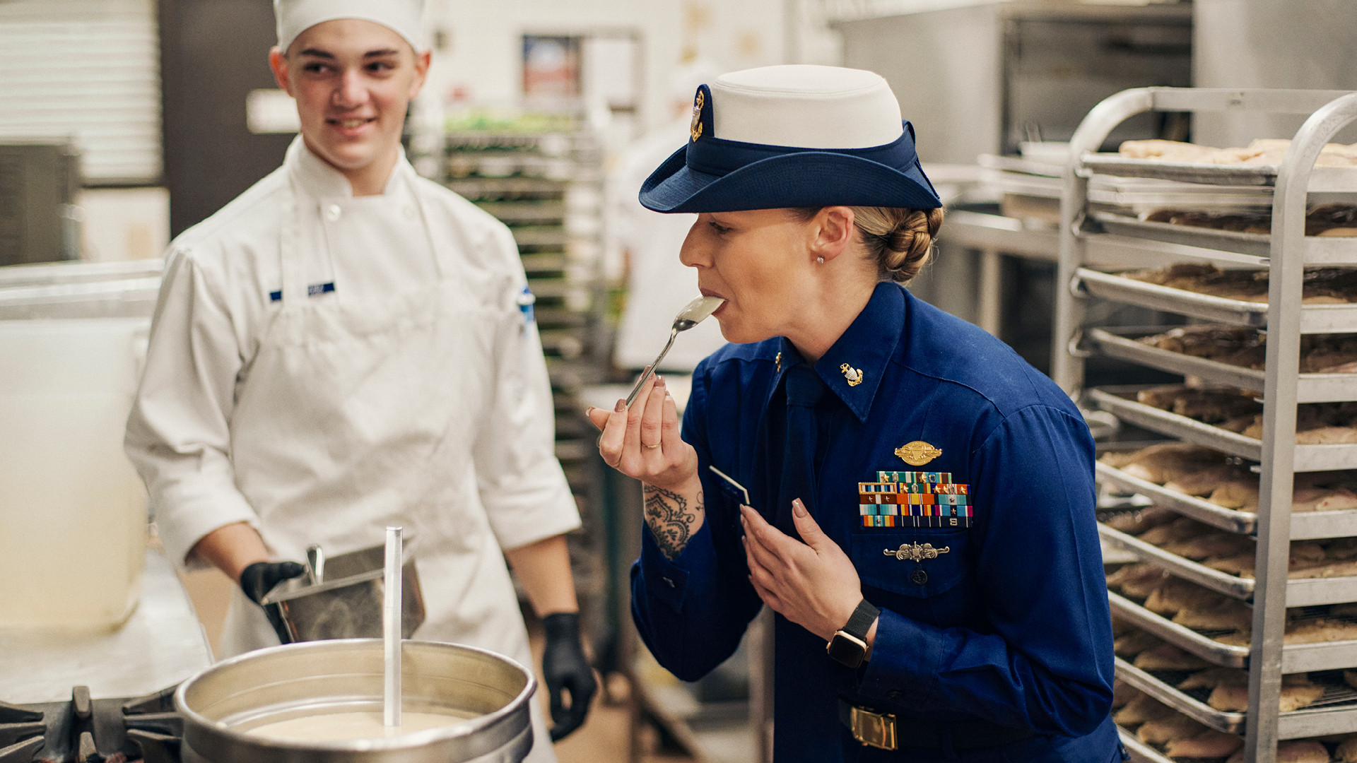 Arianne Gunn tasting a dish