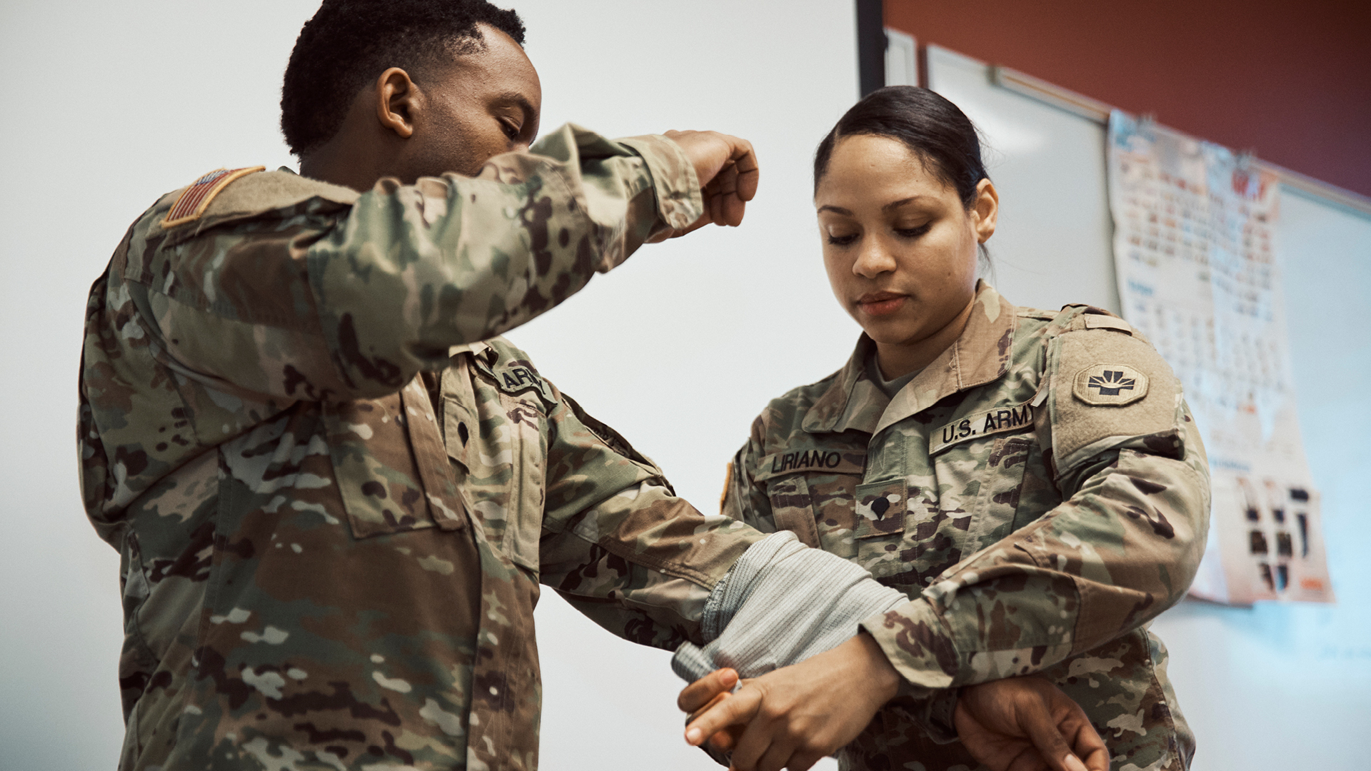 Jennifer Liriano wrapping a wrist