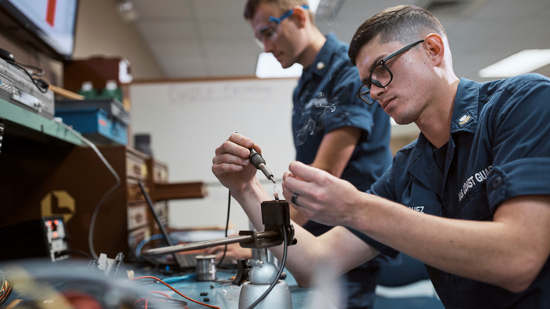 Adrian Vaszquez working with a Coworker