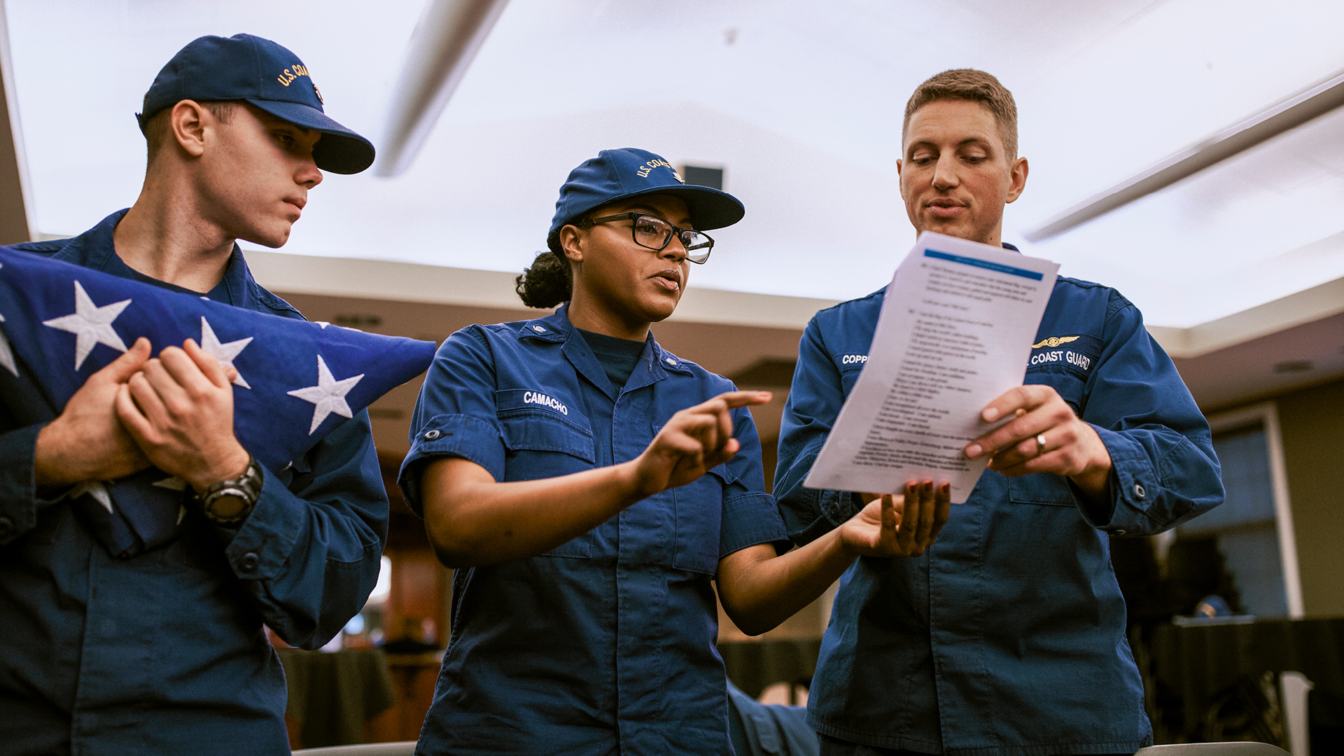 Dejanai Camacho working with colleagues