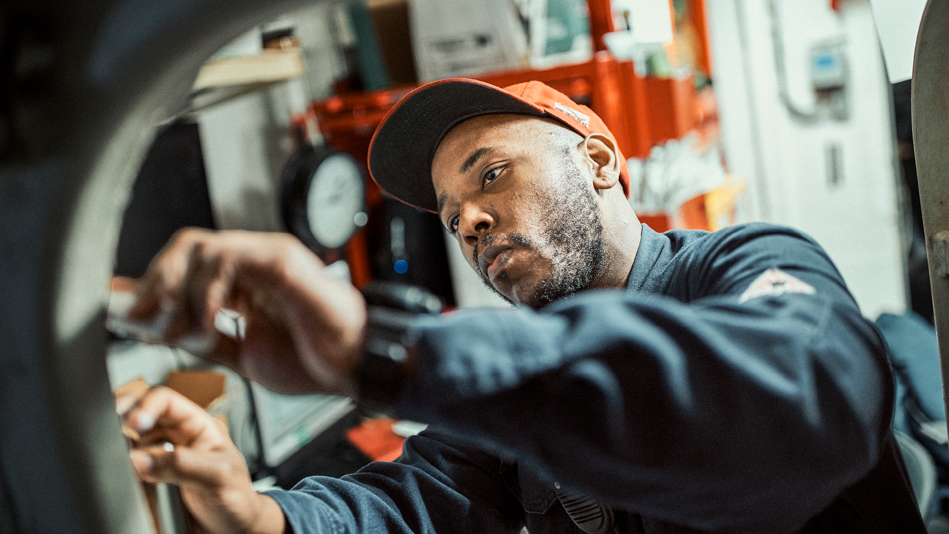 Sidney Wilson measuring for a repair