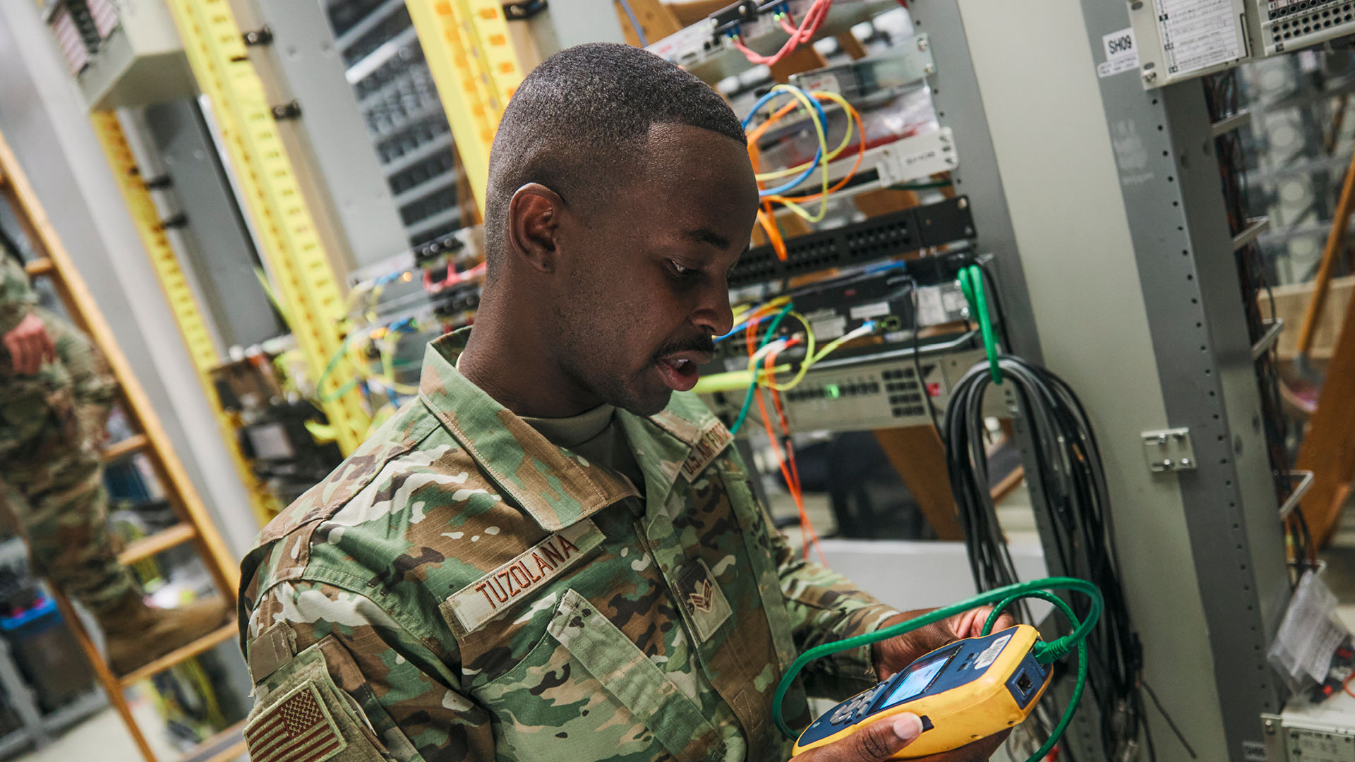 Daniel Tuzolana checking voltage