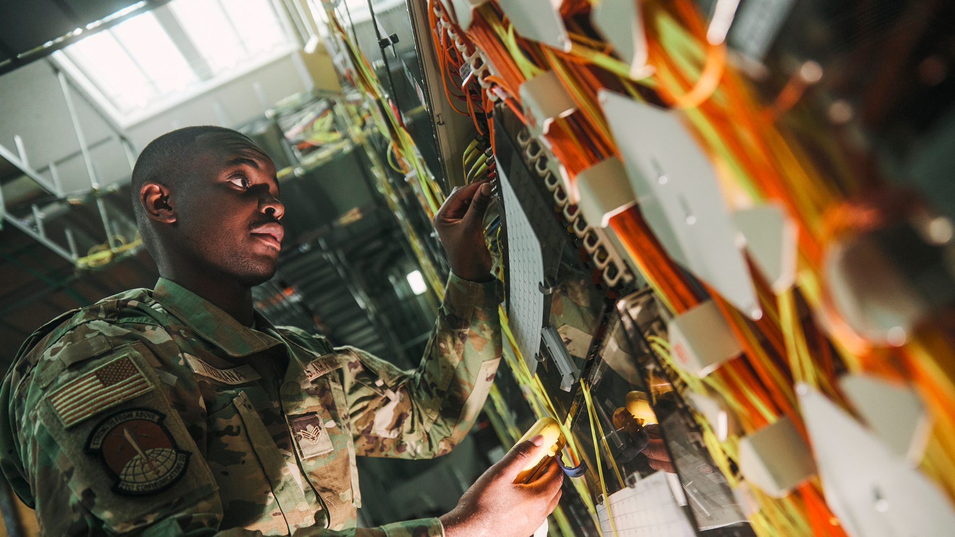 Daniel Tuzolana working on more wires