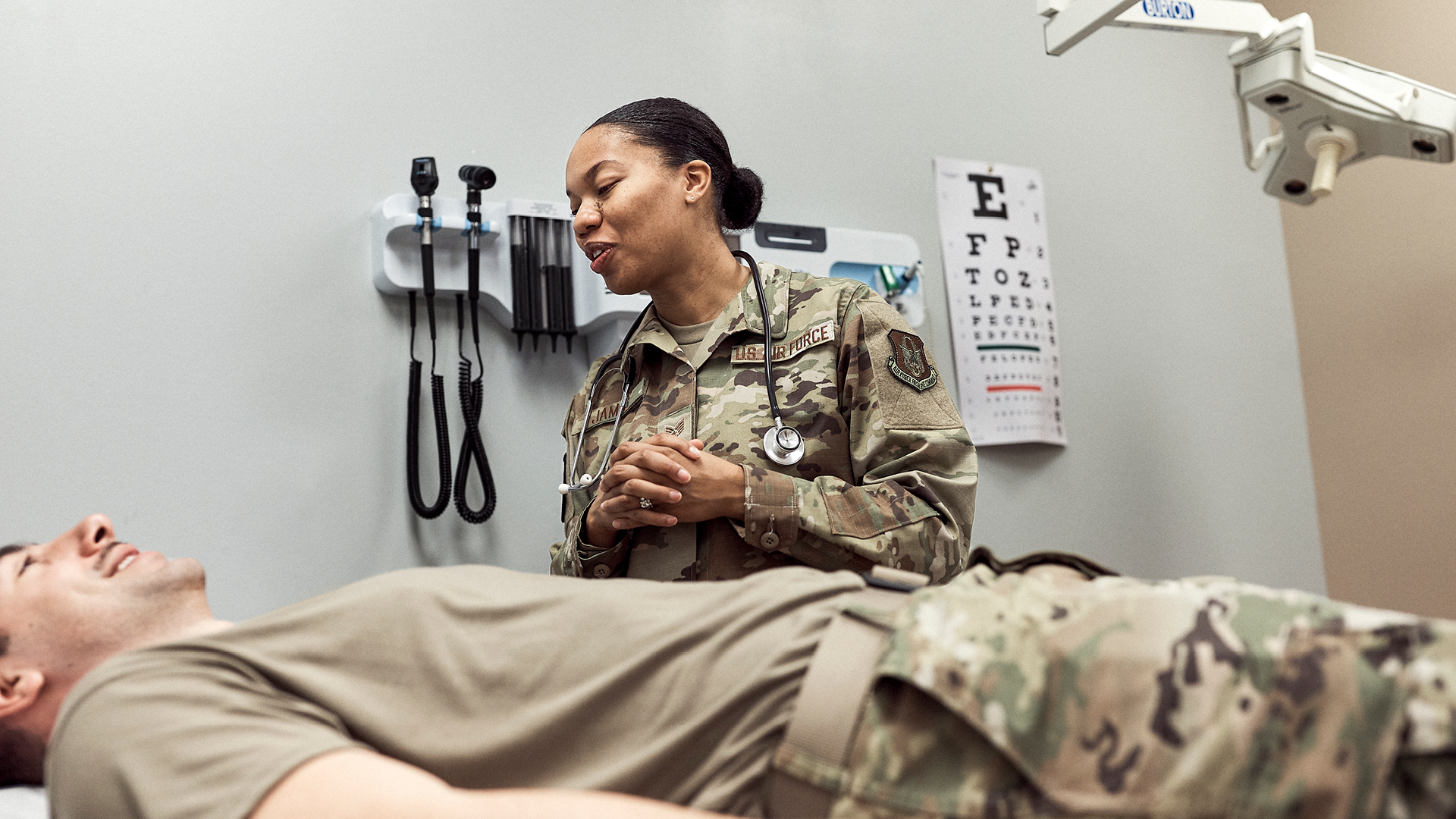 Kaylan James working with a patient