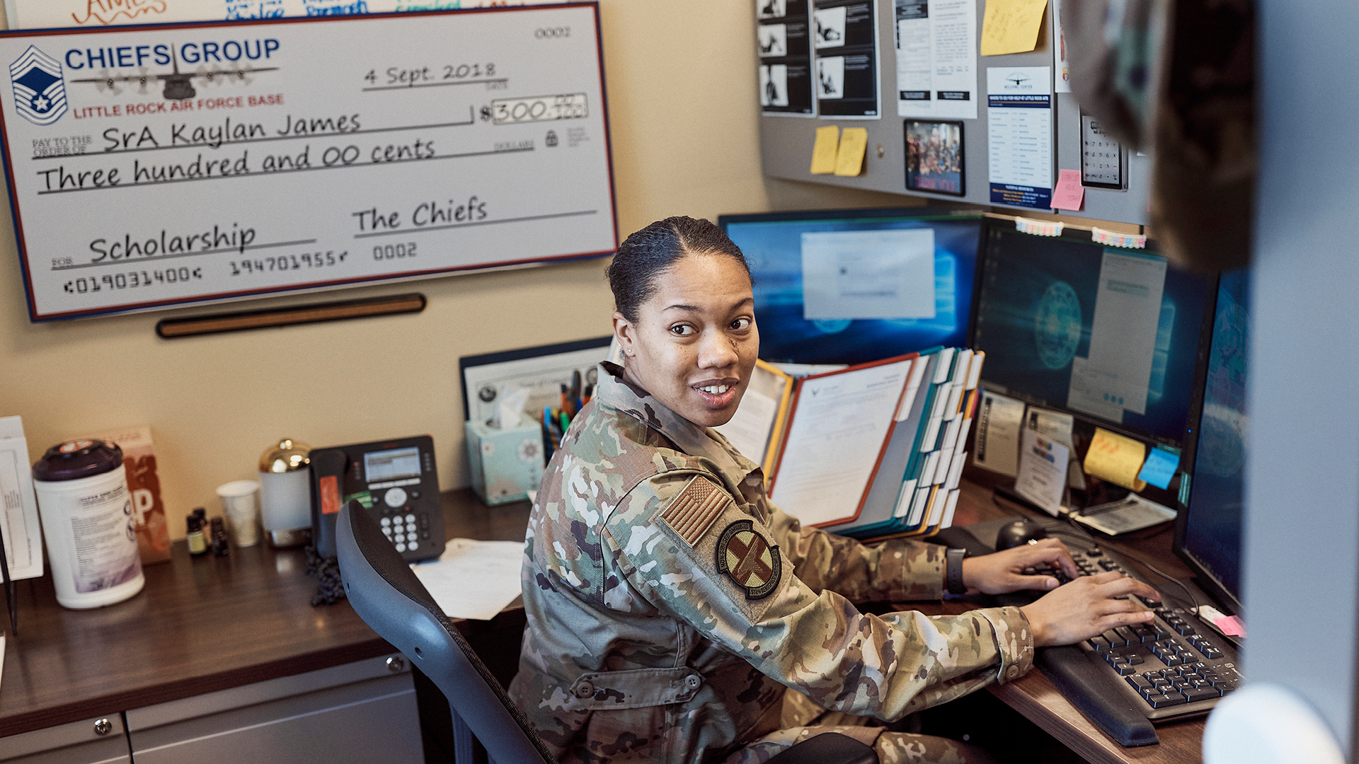 Kaylan James working at her desk