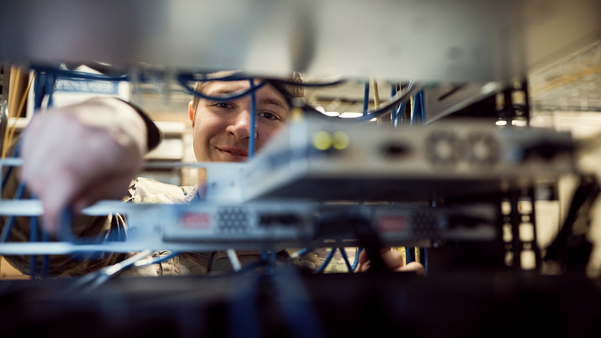 Logan Balvik fixing a wire