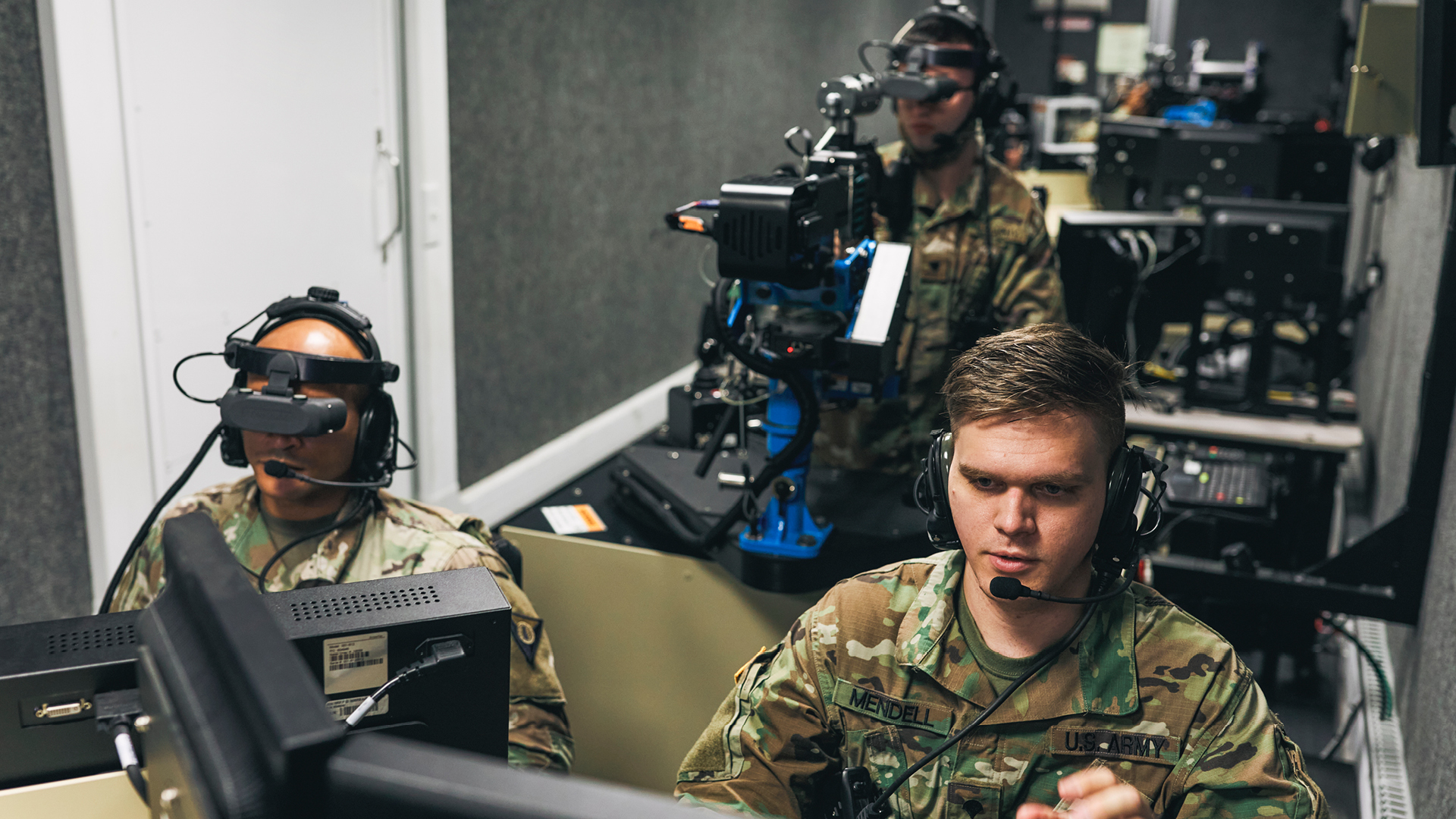 Chris Mendell talking into a microphone