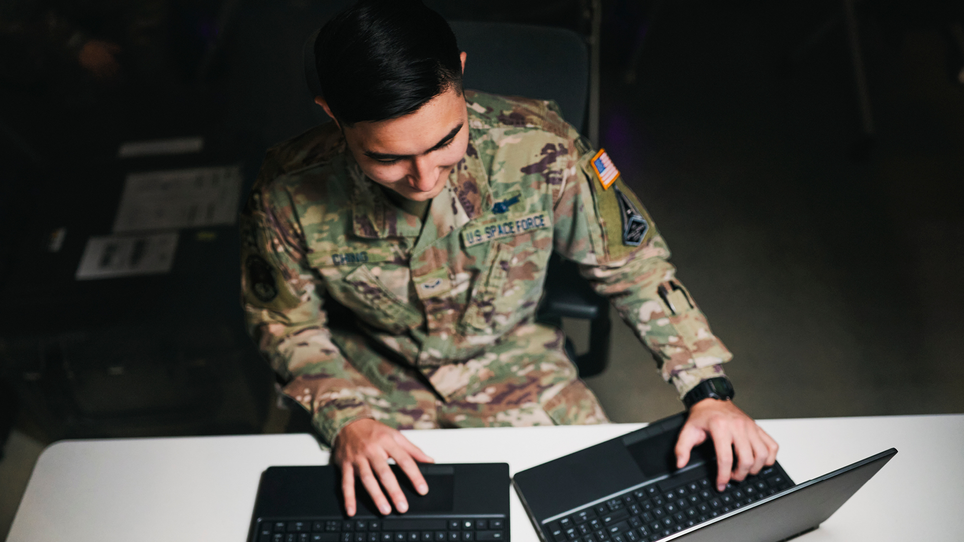 Trenton Ching working on two computers at one time