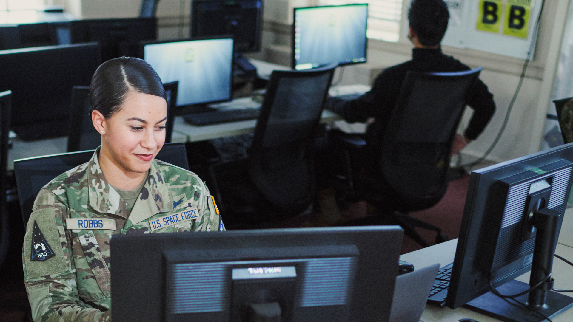 Chanel Robbs working at a computer