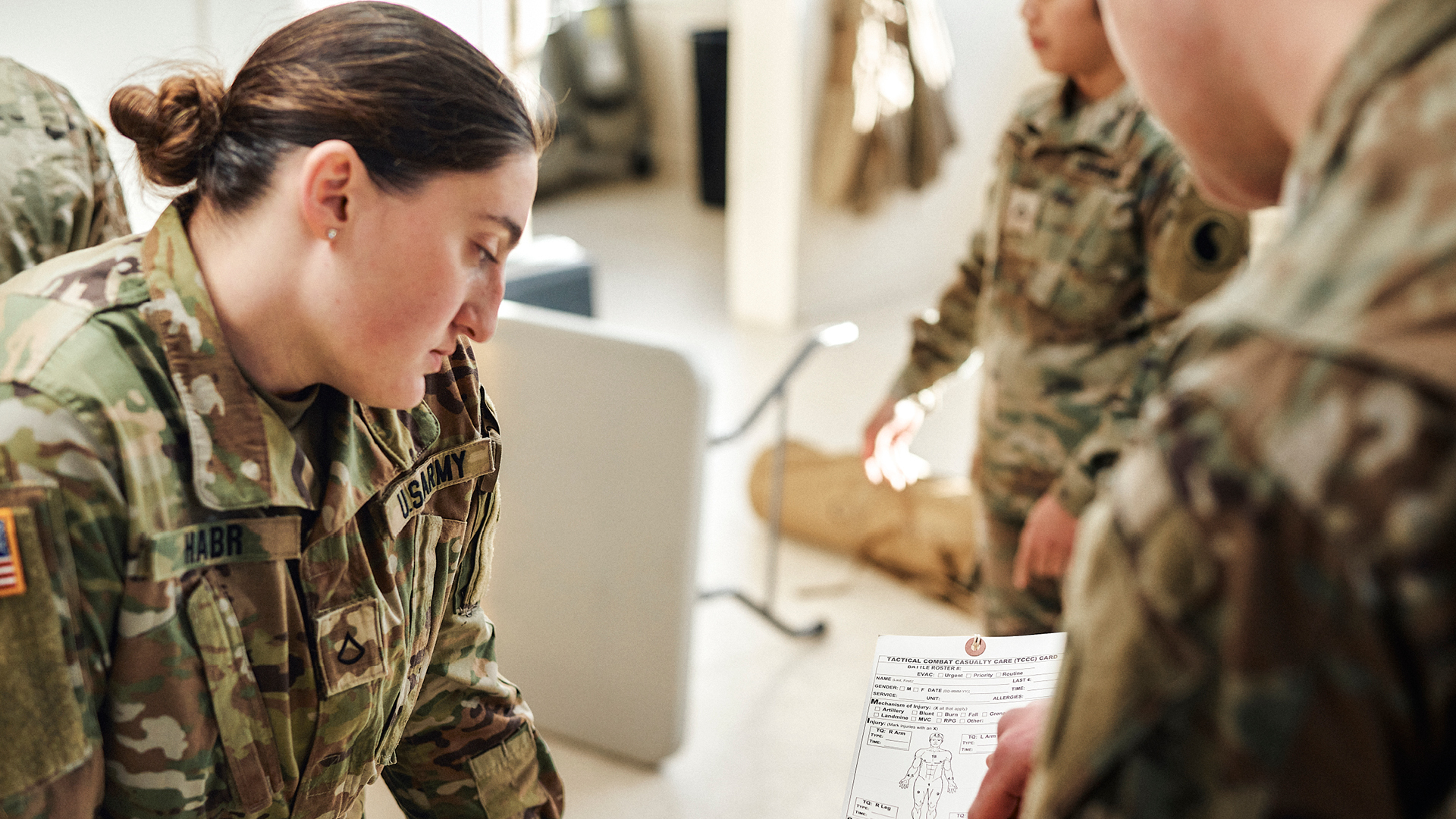 Noor Habr showing students how to perform