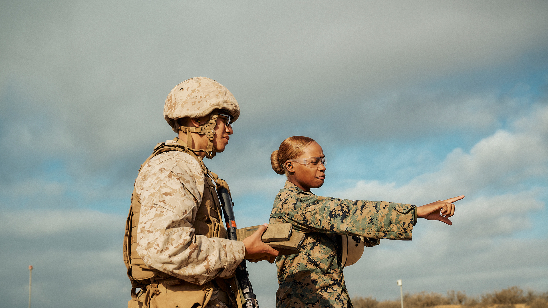 Chyna Gibbs with another coworker pointing