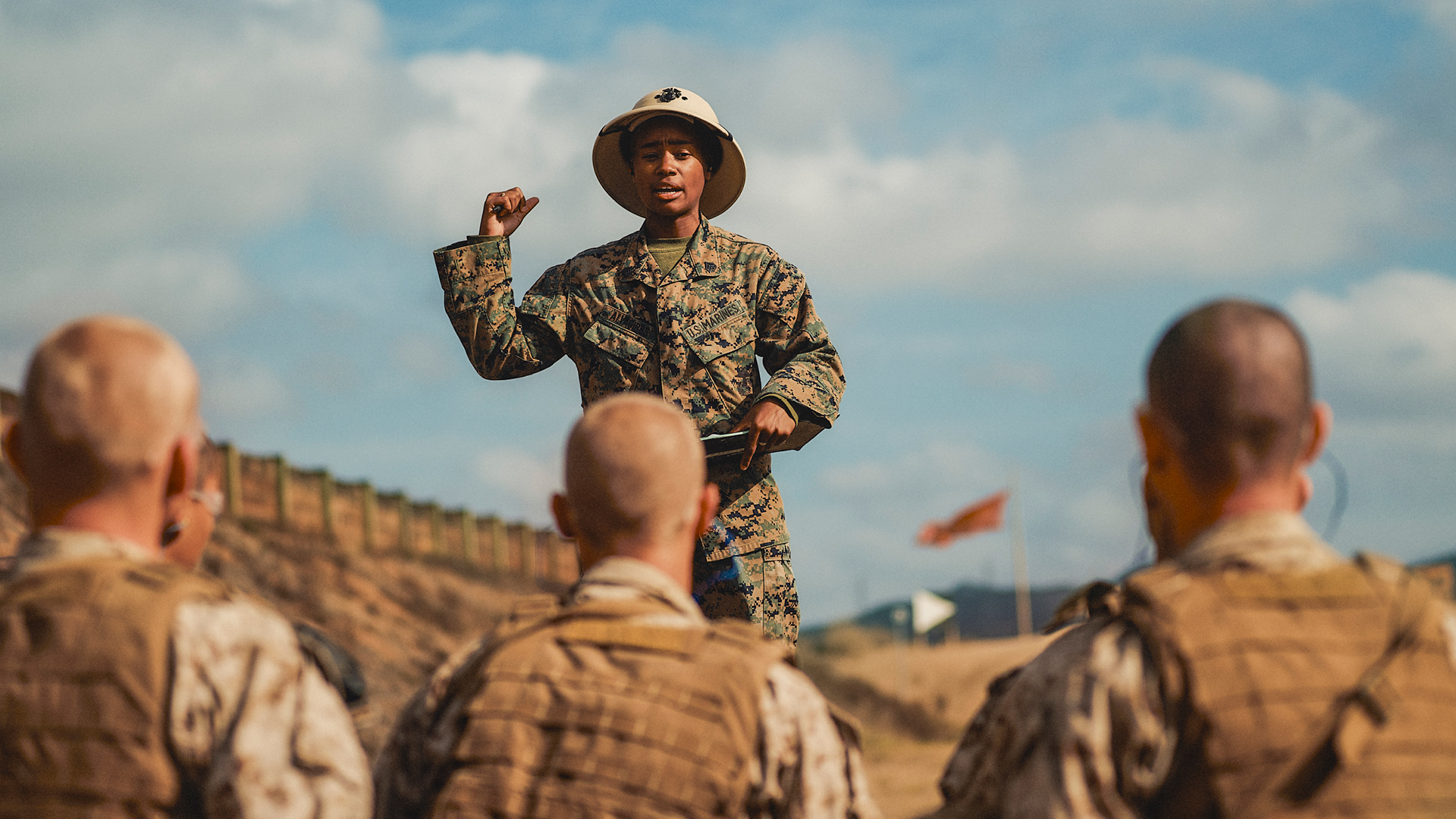 Chyna Gibbs providing intructions to other coworker