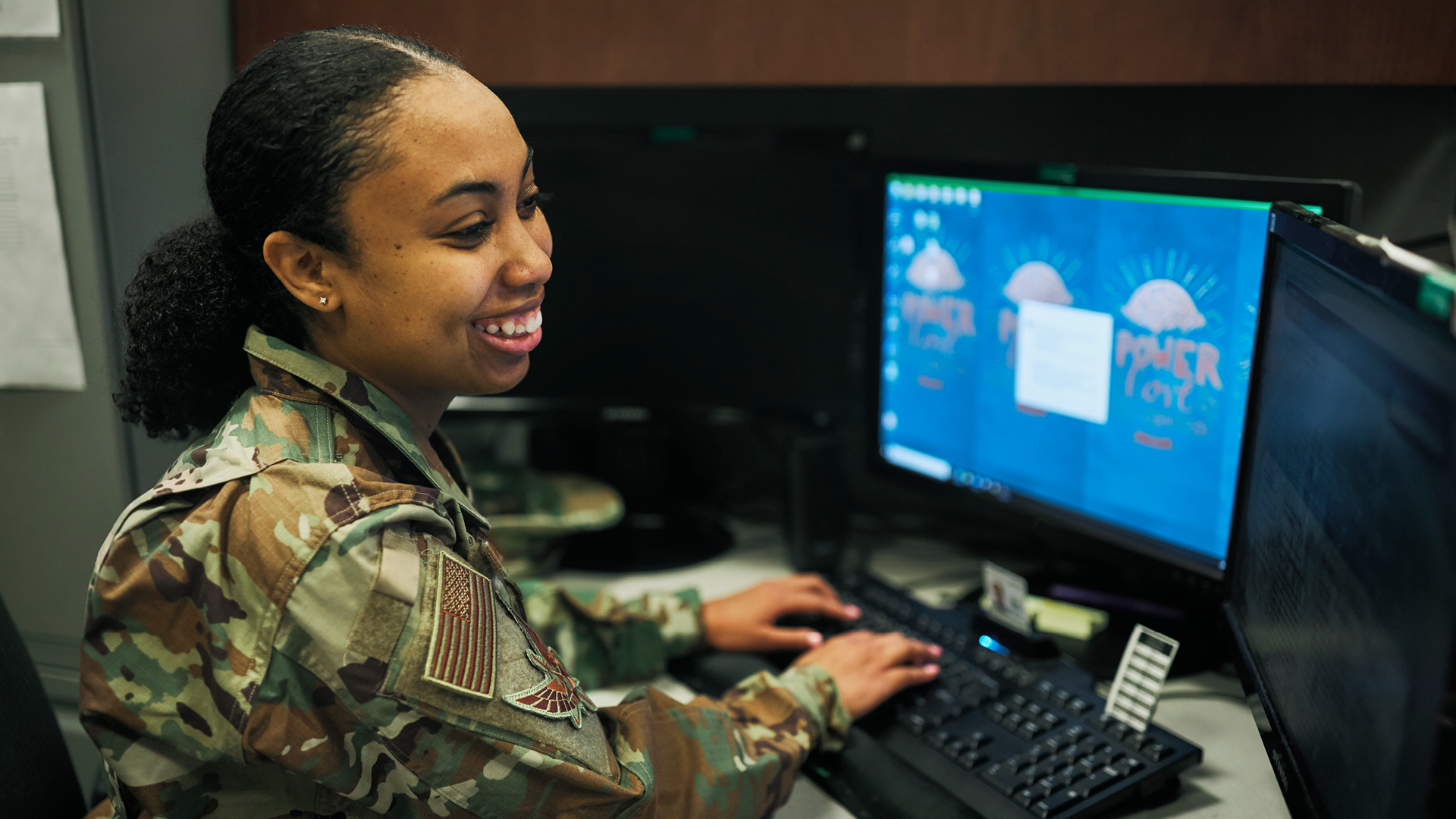 Juntranek Powell at a computer working