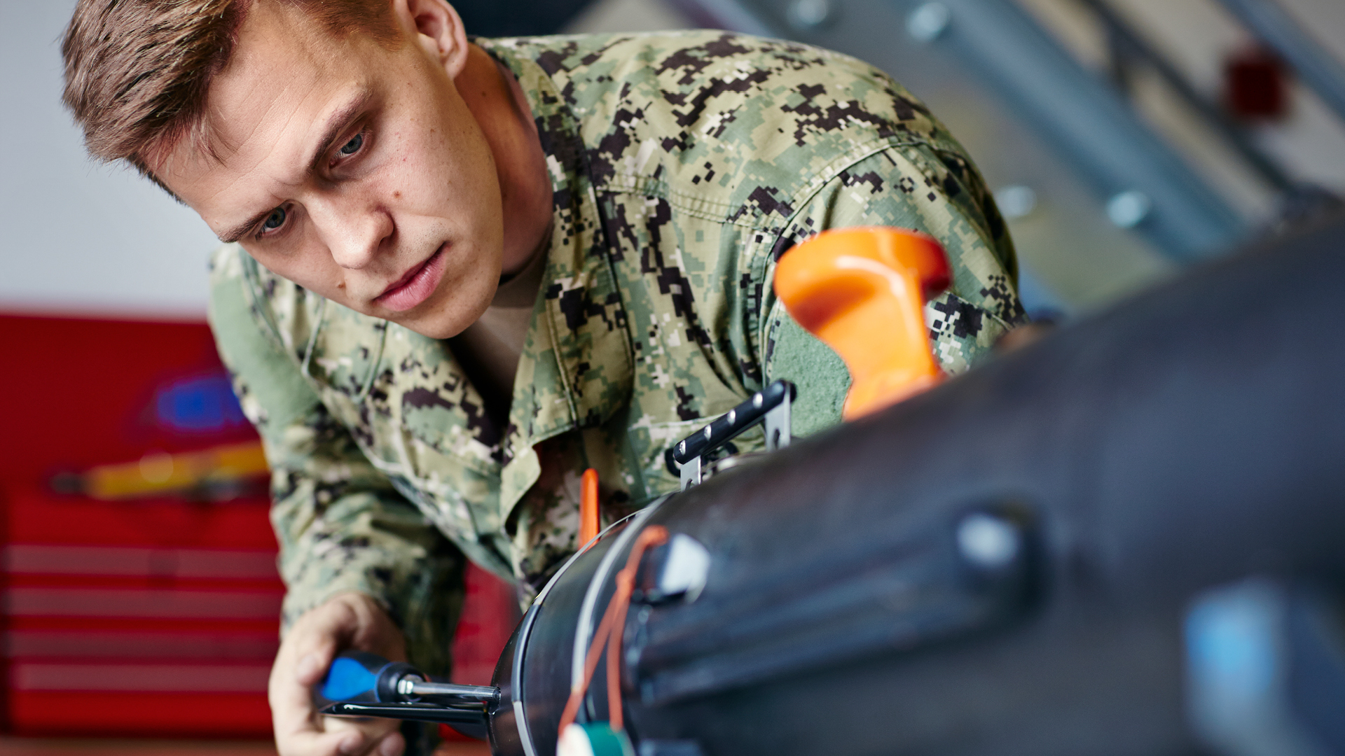 Alex working on an explosive device
