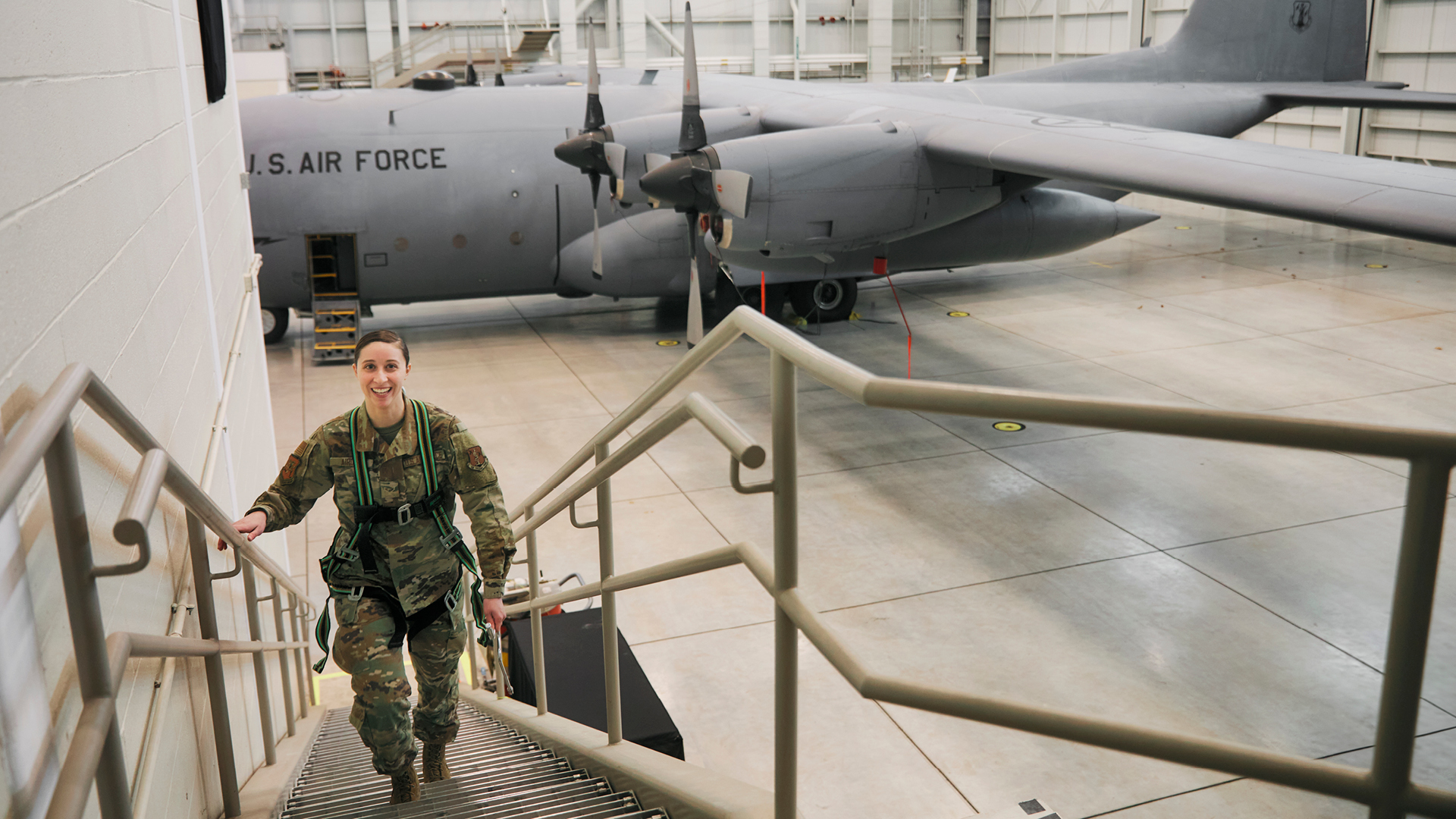 Marissa Airoldi walking up stairs to get into a harness