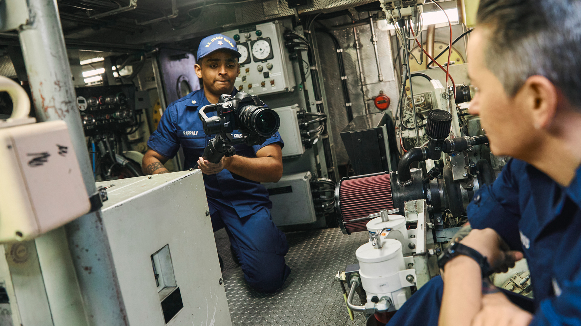 Anthony filming a coworker inside