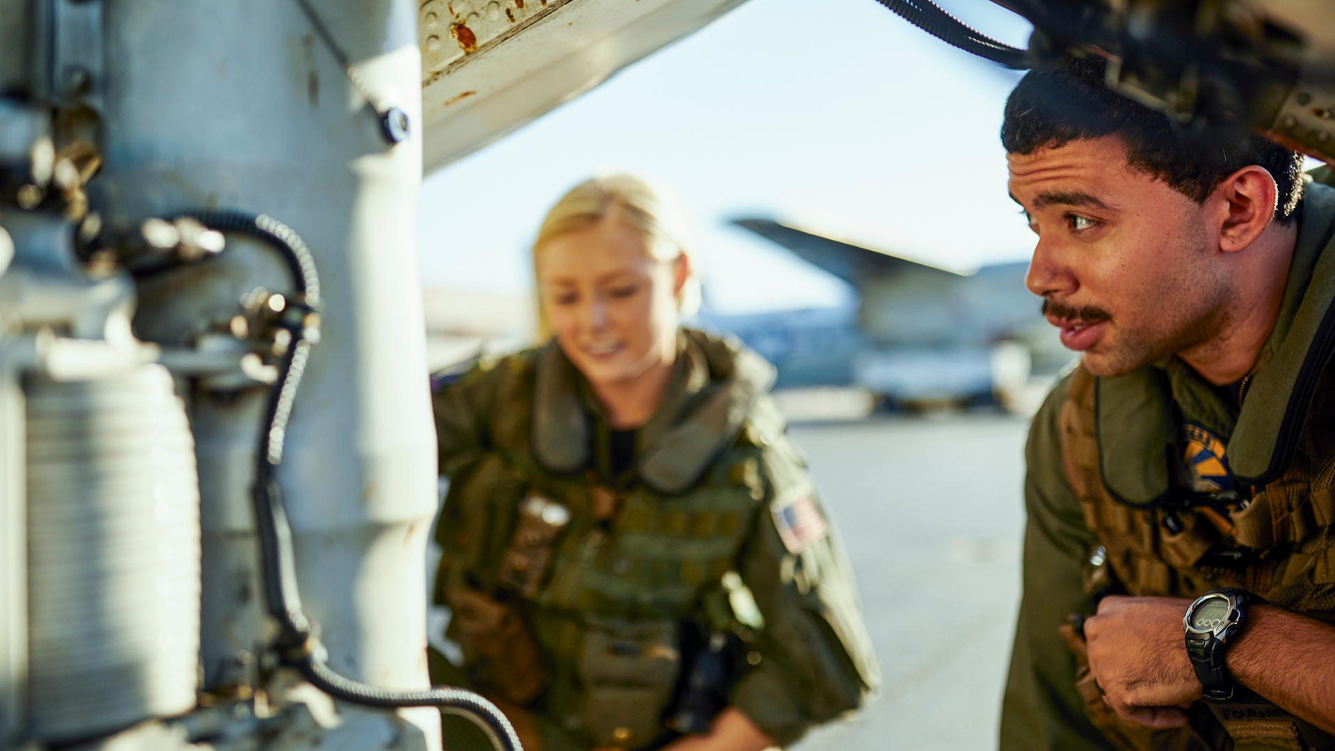 Des Fournier inspecting the plane with another coworker
