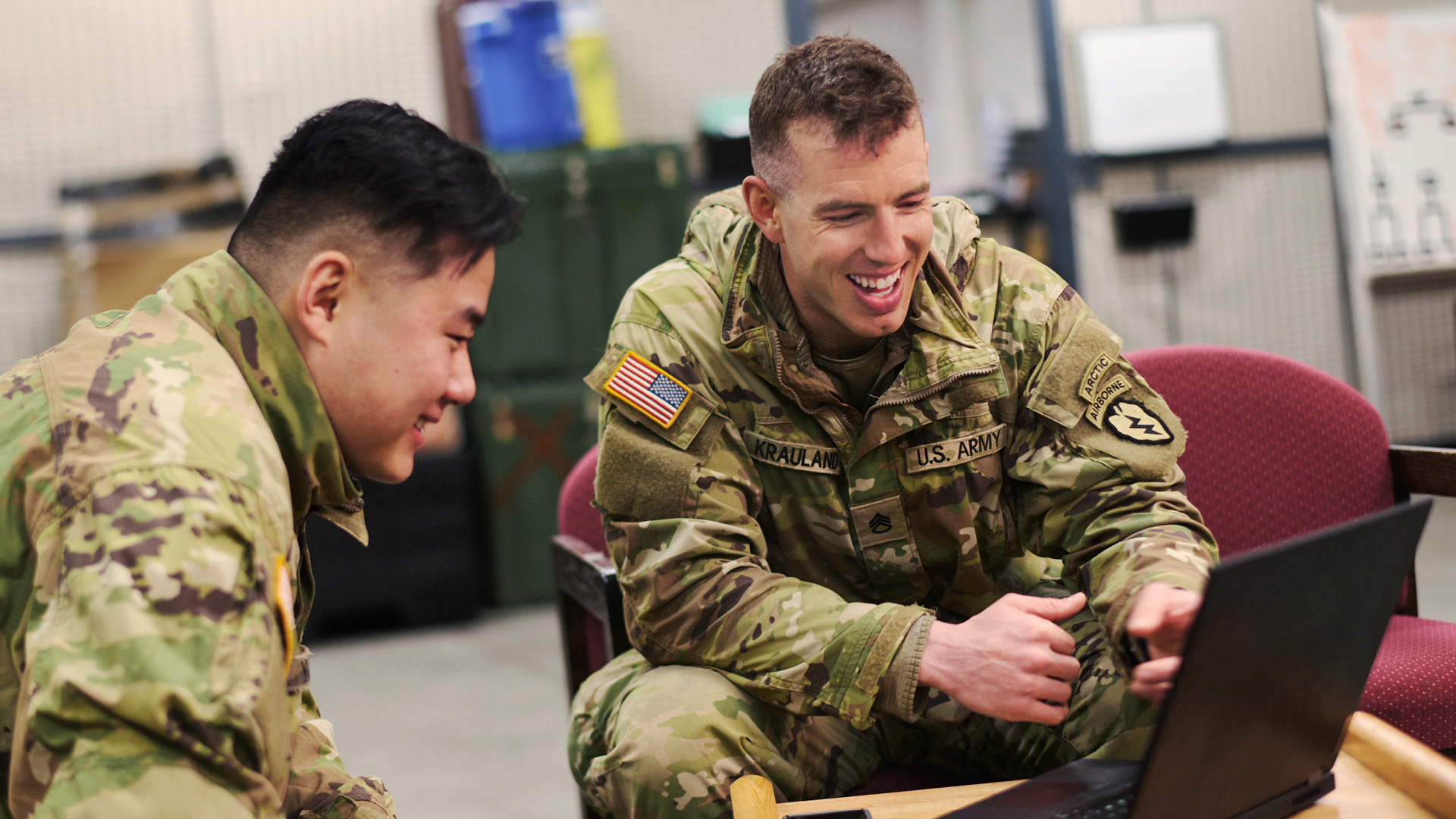Adam Krauland talking with a coworkers