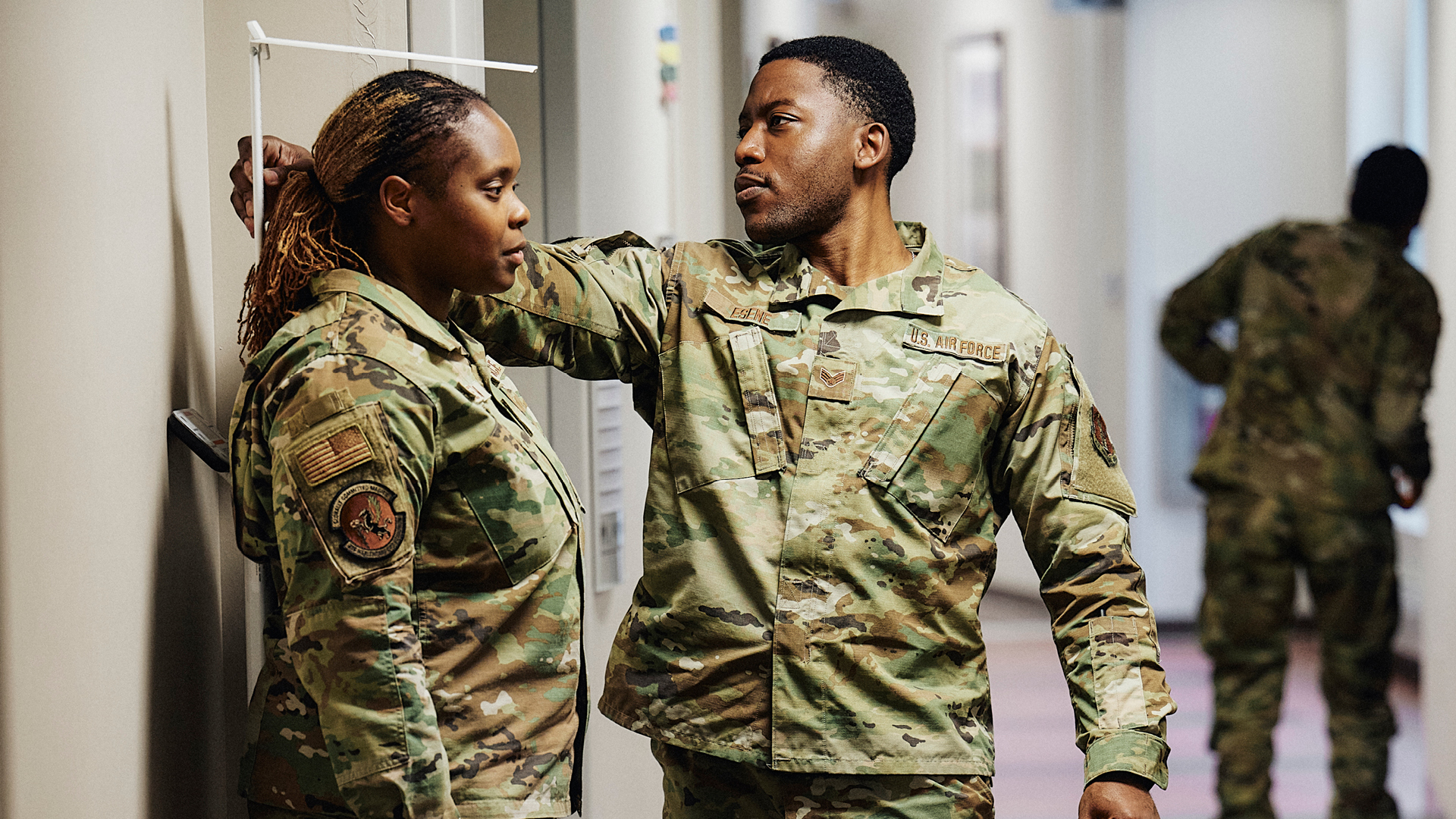 Isaac Esene checking the height of a patient