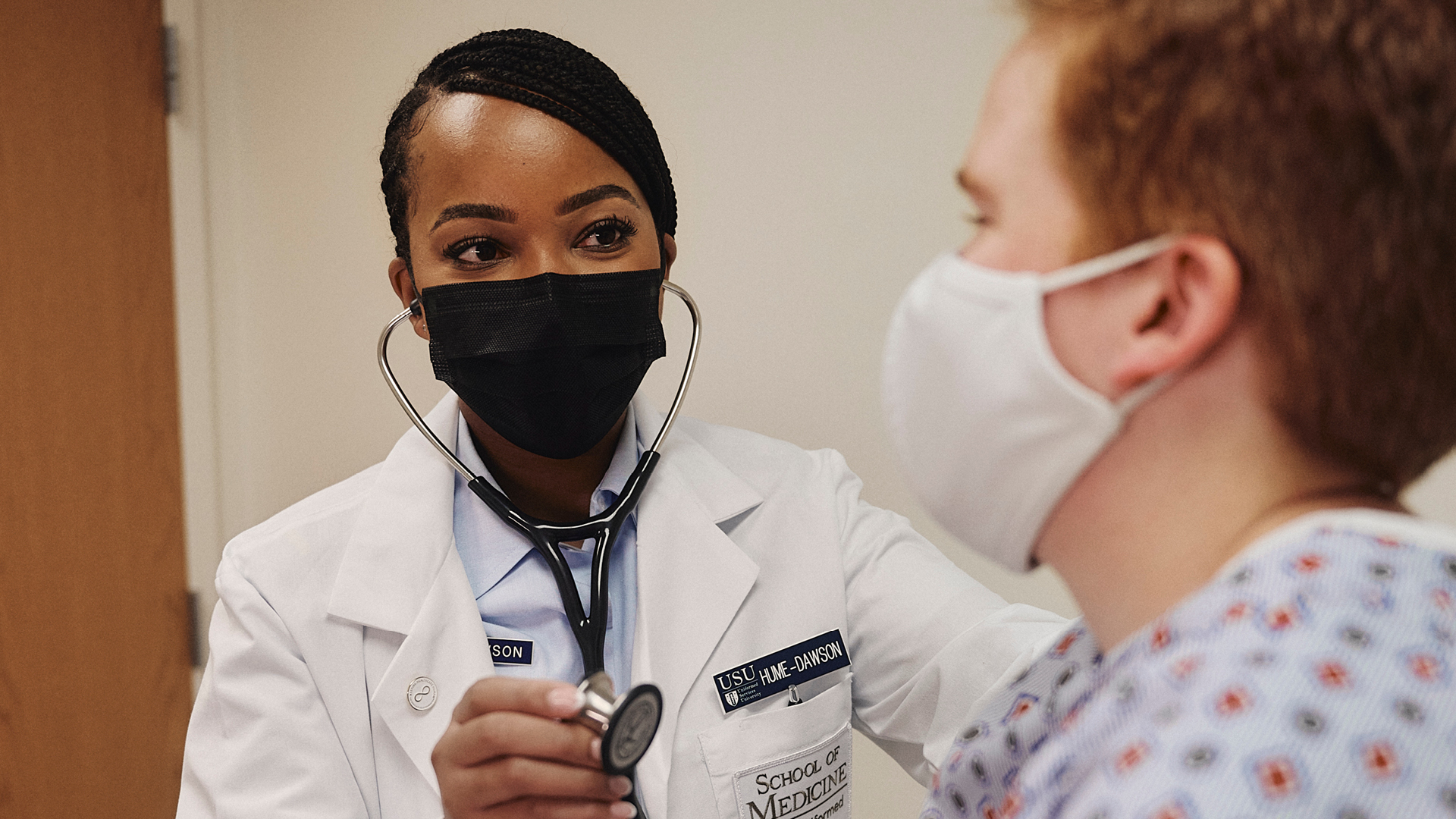 Brittany working with a patient