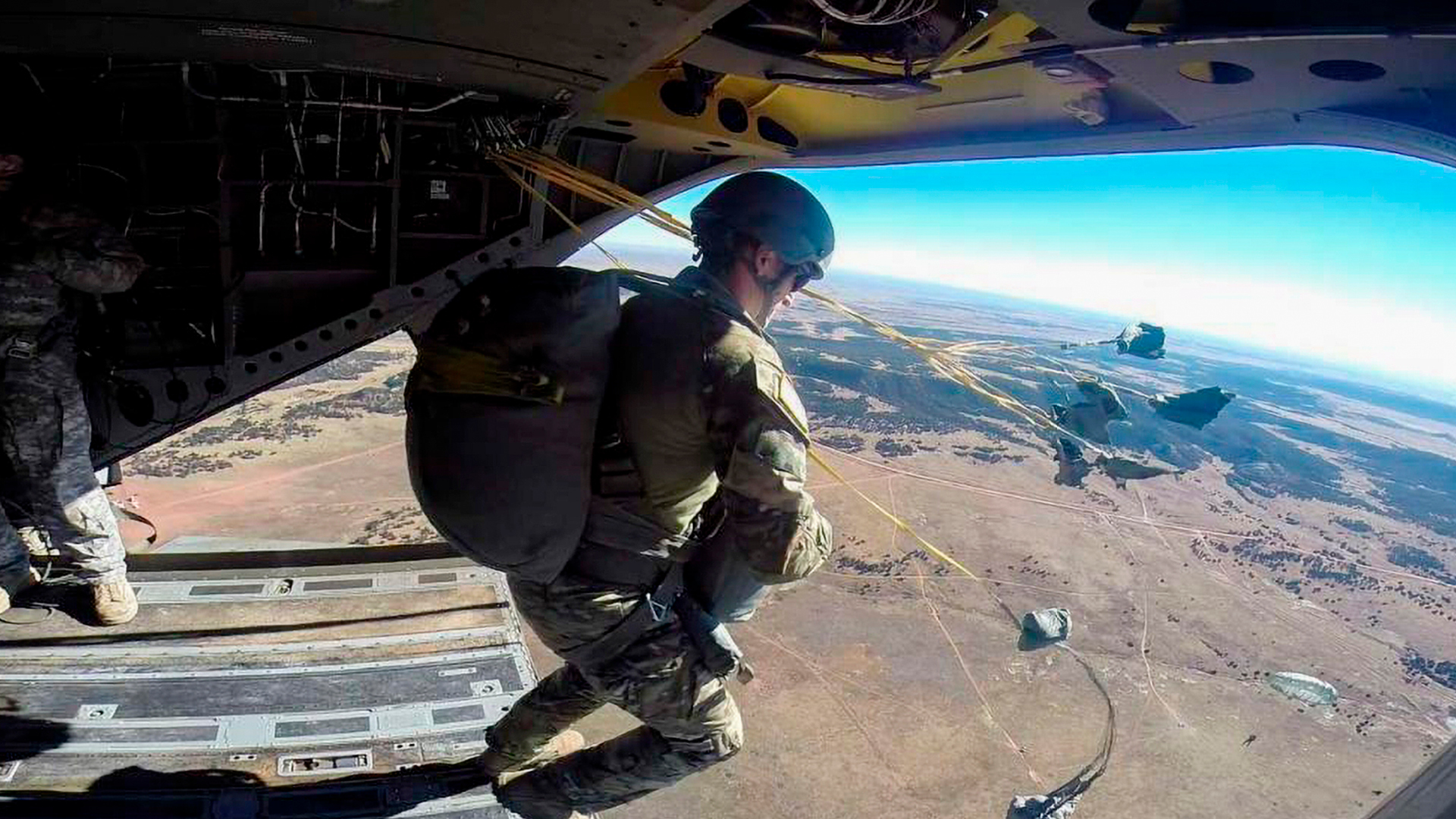Hunter jumping out of a plane