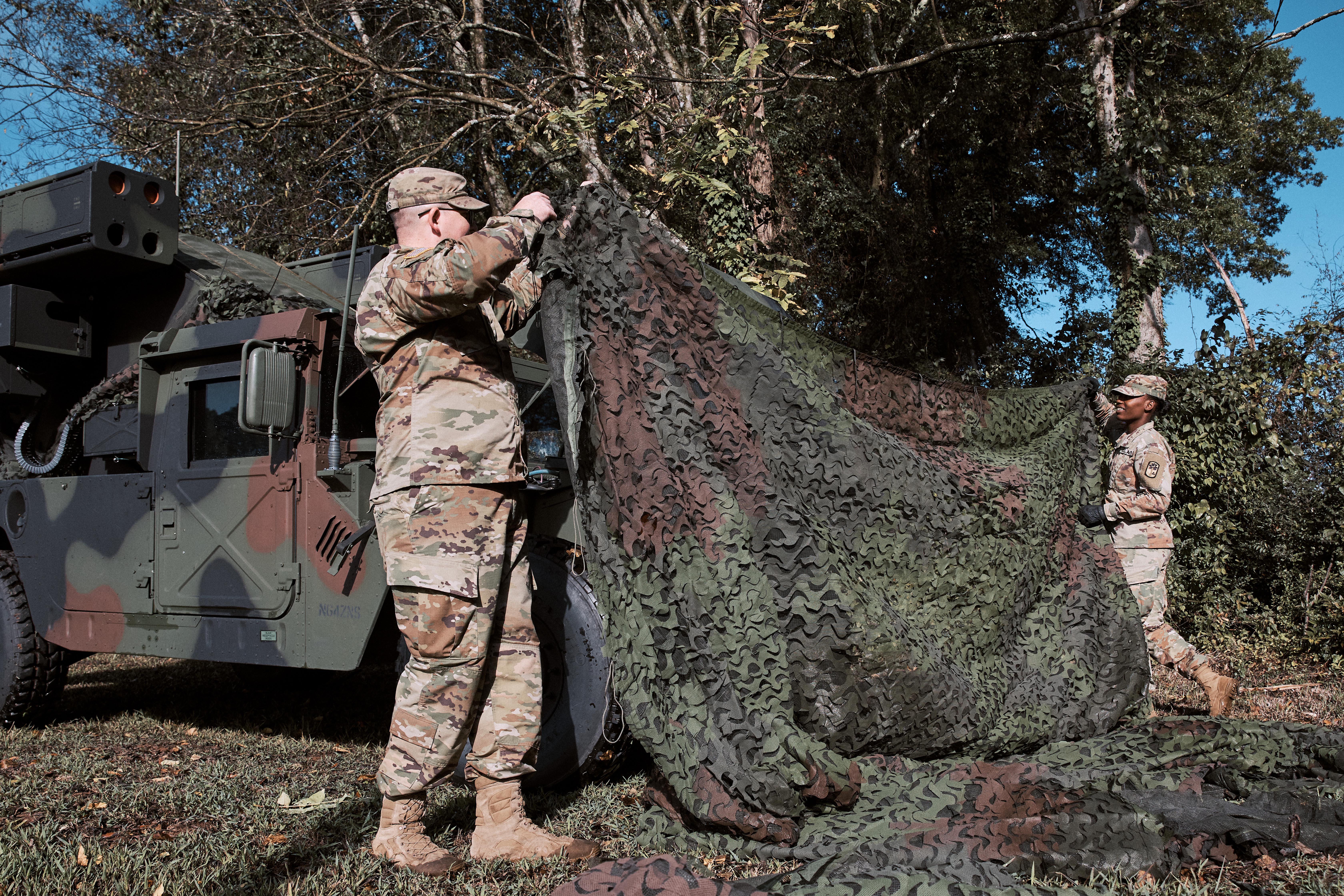 Jauntavia Prather working with another Service Member