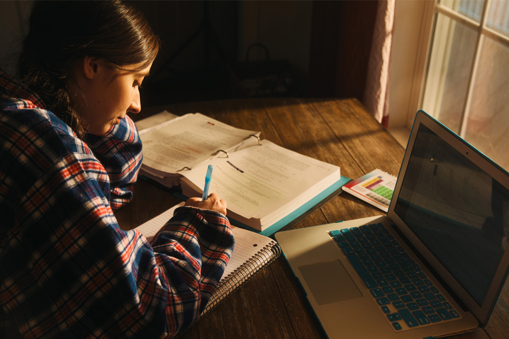 Marissa studying in front of a computer