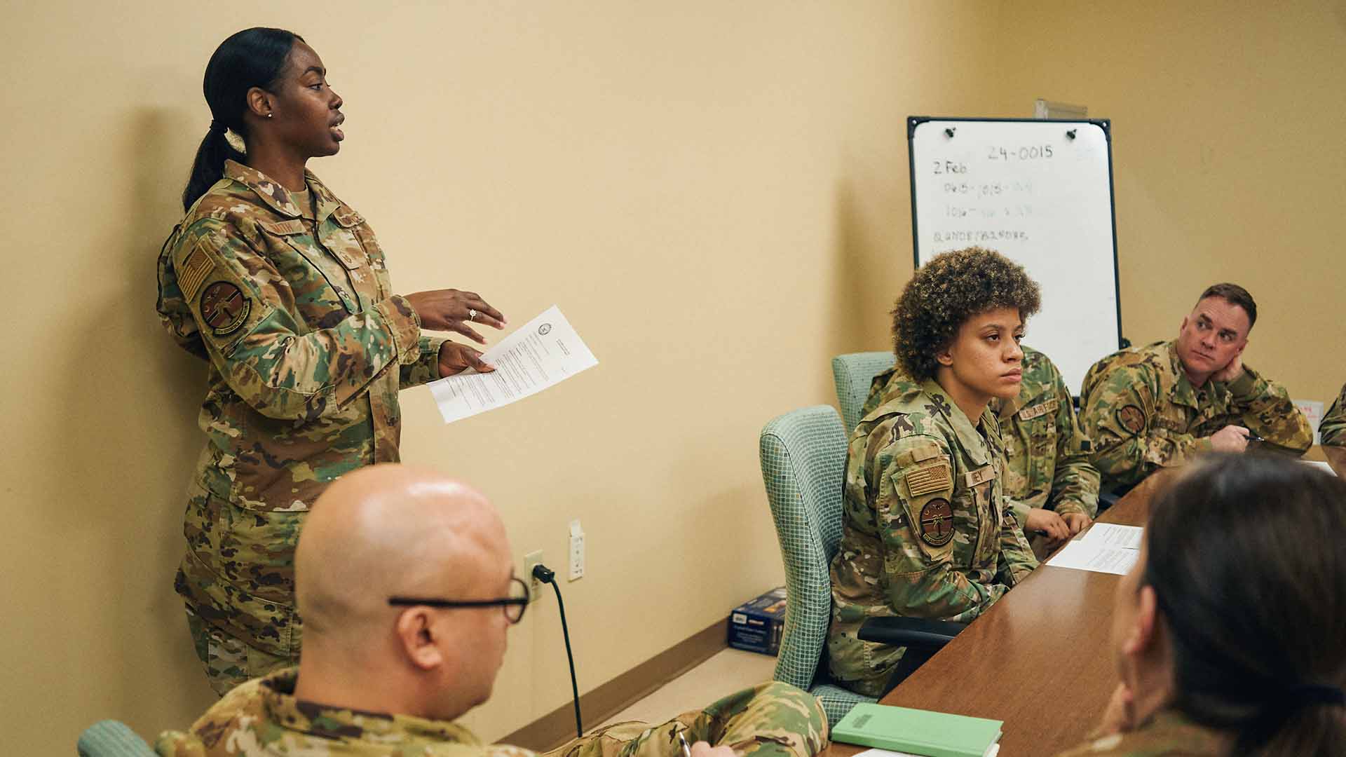 Shakeyna Smith talking with other service members