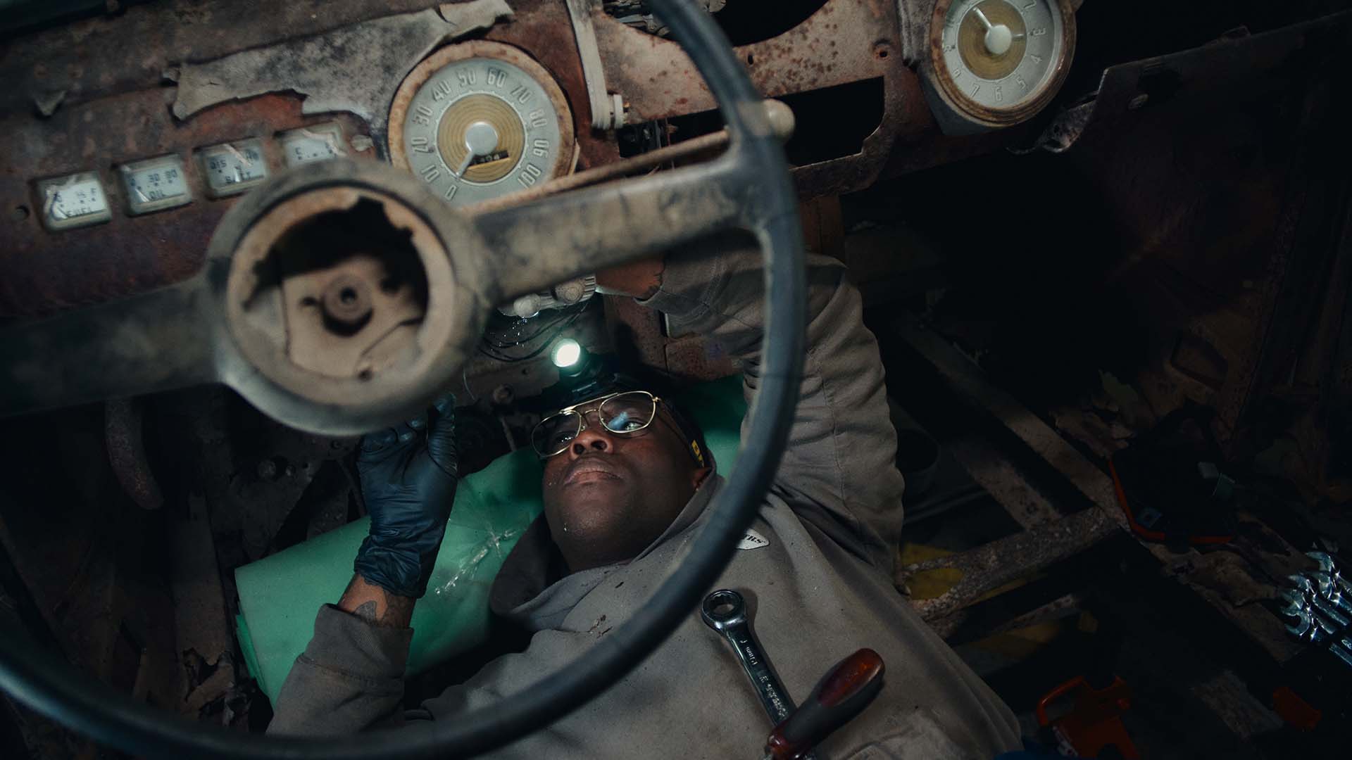 Daviyd “Rex” Hearn working on a car