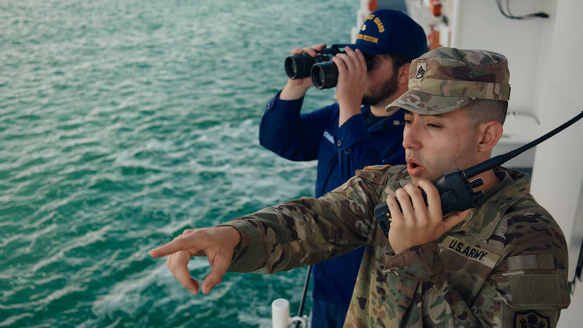Juan Canas, pointing out something in the ocean