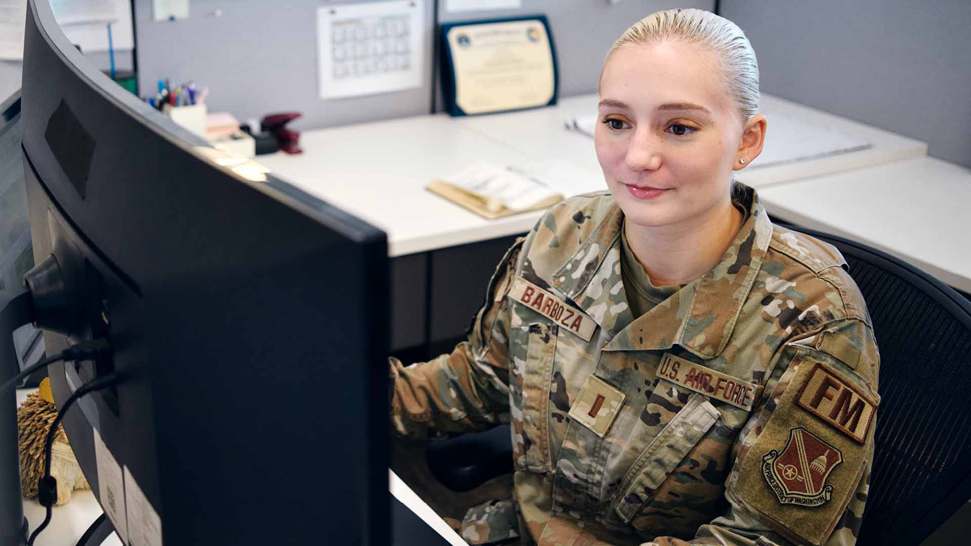 Hope Barboza working on a computer