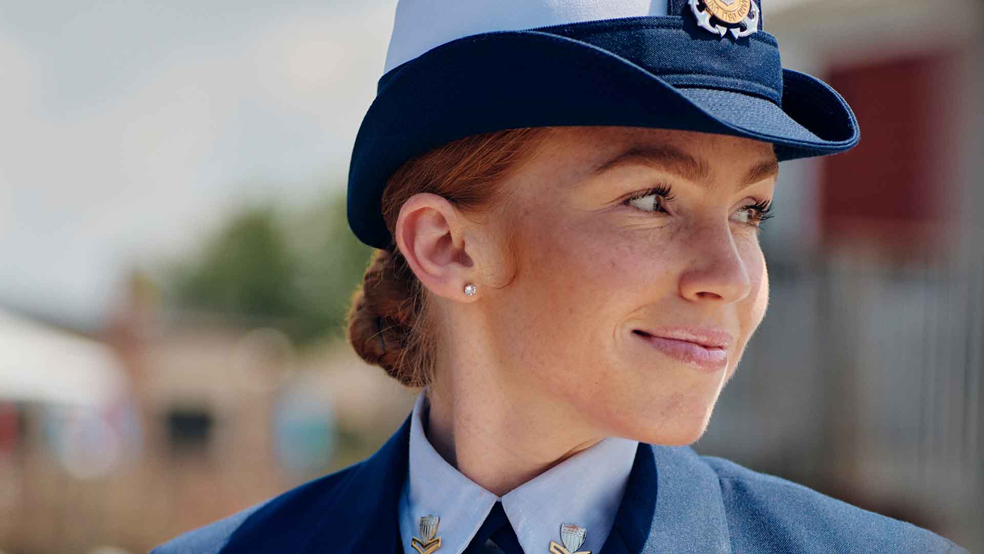 Taylor DeHoratiis in uniform looking off into the distance