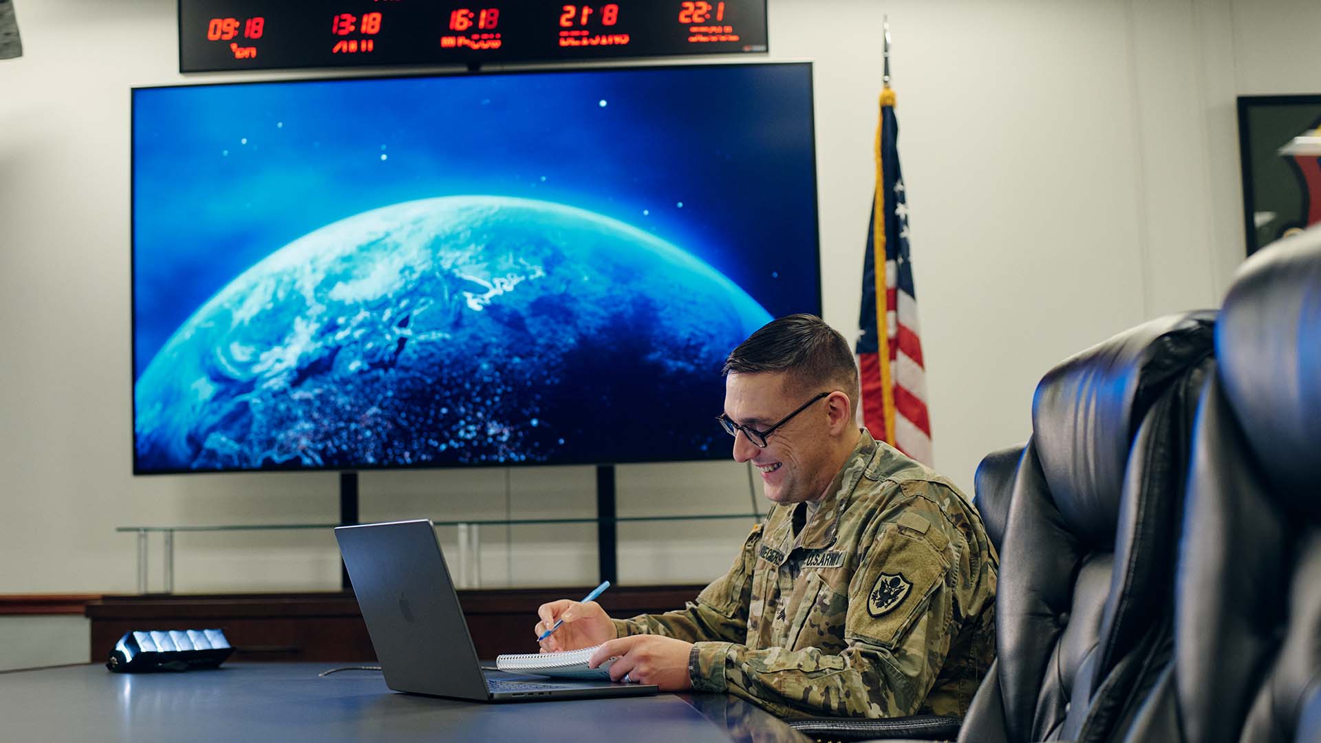 Justin Ciecierski working at his computer.