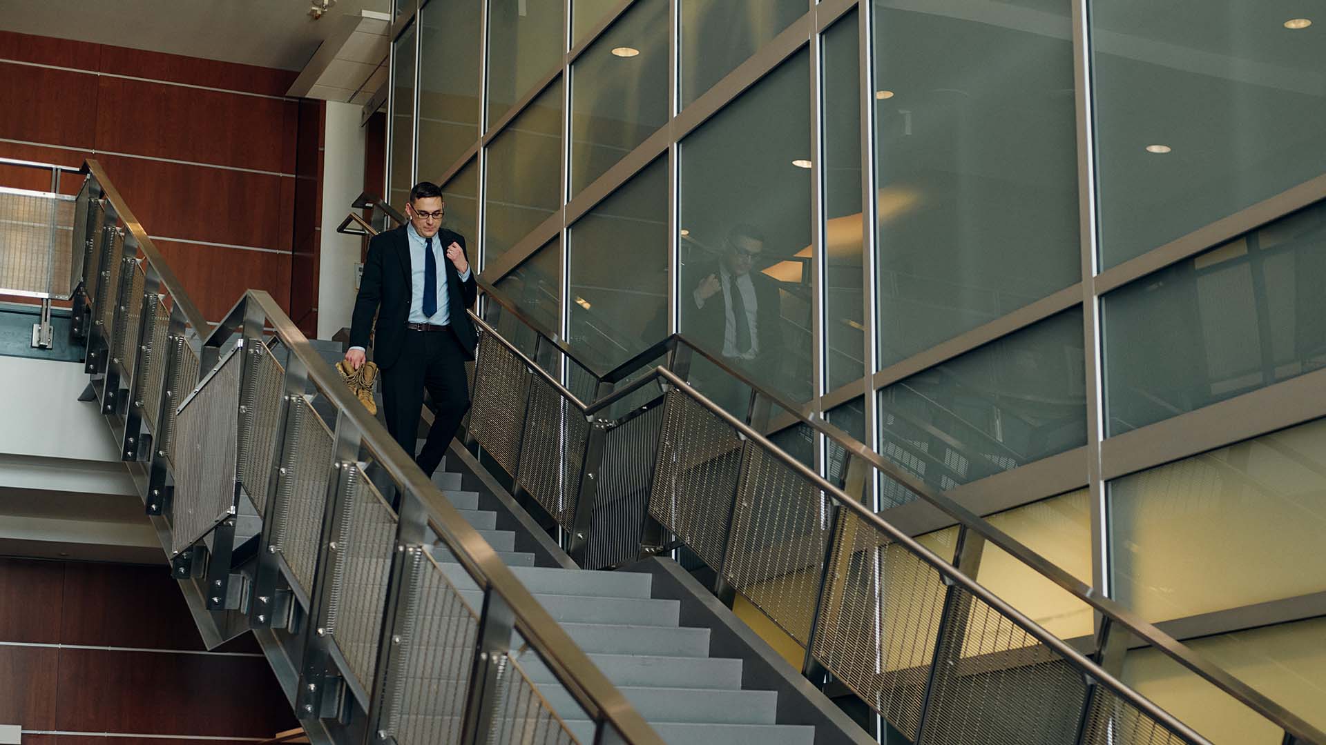 Justin Ciecierski walking in the office.